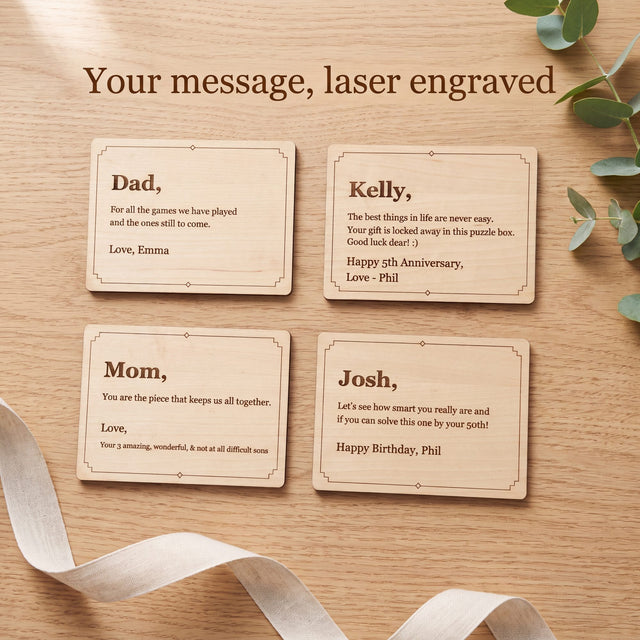 Four engraved wood message cards on an oak table with example messages for a father, an anniversary, a mother and a birthday