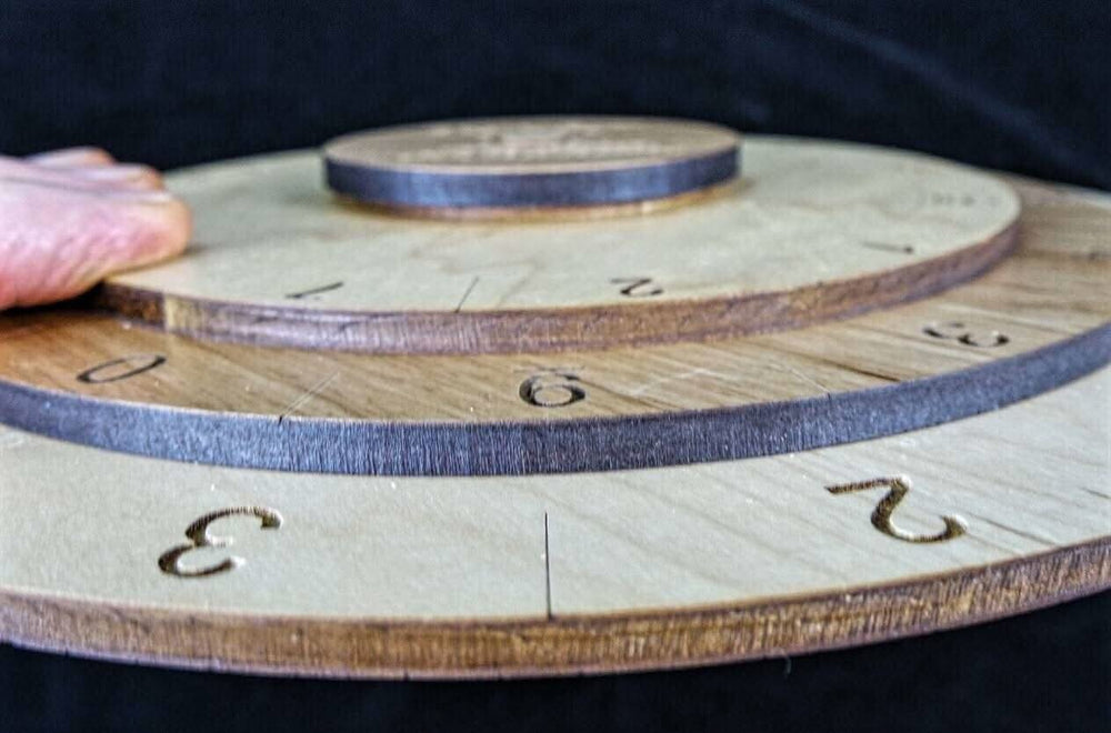 Secret Sum Puzzle Wheel – arrange the disks such that all columns add to the same number - Creative Crafthouse