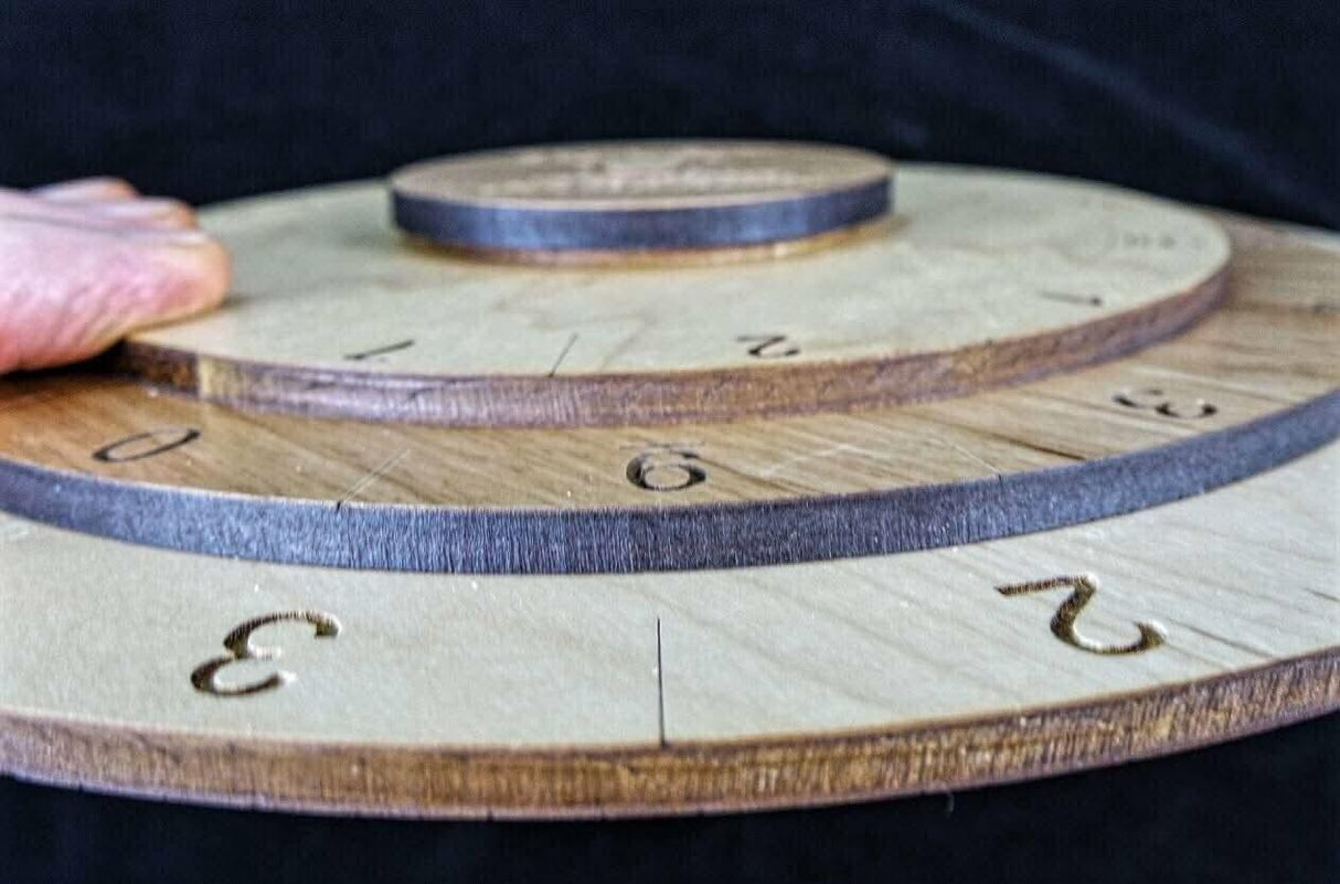 Secret Sum Puzzle Wheel – arrange the disks such that all columns add to the same number - Creative Crafthouse