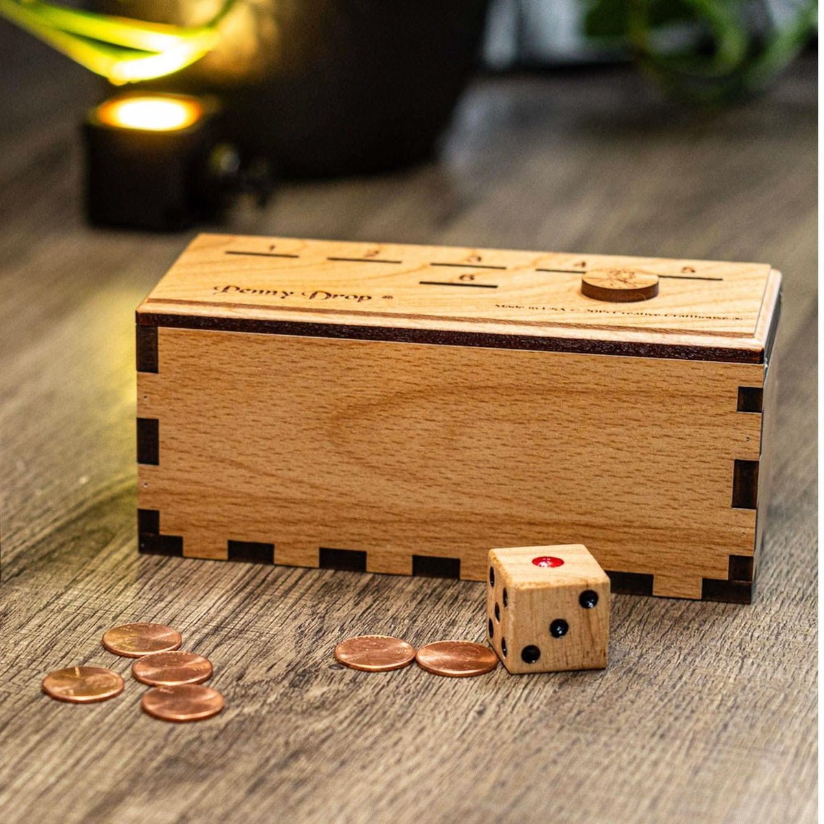 Original Penny Drop gift: numbered wooden playing lid, die and loose pennies