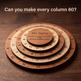 The 60 Alpha puzzle on a dark wood desk, its rings of engraved numbers and letters stacked around the center cap. Headline: Can you make every column 60?