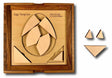 Handcrafted Dragon's Egg Tangram Puzzle made from premium maple wood, featuring intricate laser-cut pieces arranged in an egg shape.