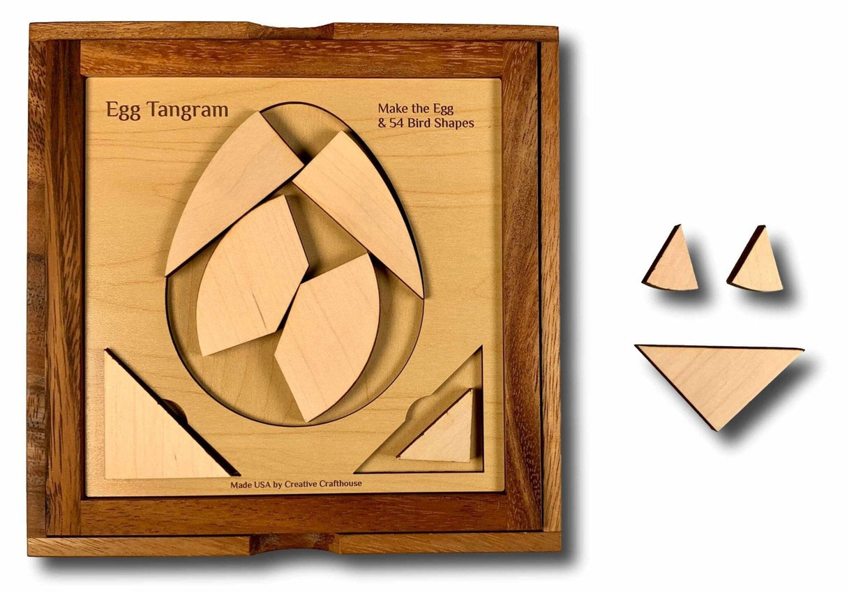 Handcrafted Dragon's Egg Tangram Puzzle made from premium maple wood, featuring intricate laser-cut pieces arranged in an egg shape.