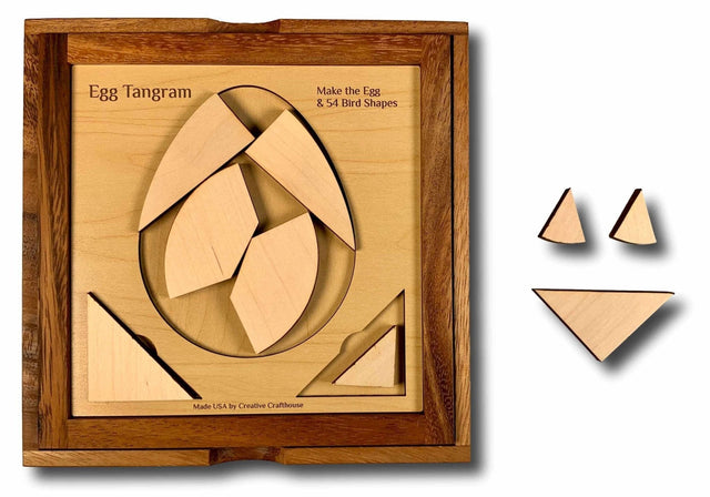 Handcrafted Dragon's Egg Tangram Puzzle made from premium maple wood, featuring intricate laser-cut pieces arranged in an egg shape.
