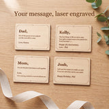 Four engraved wood message cards on an oak table with example messages for a father, an anniversary, a mother and a birthday