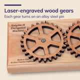 Close-up of a laser engraved Enigma II alphabet gear turning on its alloy steel pin above the engraved wood base.