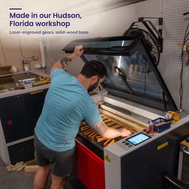 A Creative Crafthouse craftsman loading wood into the laser cutter, with the headline Made in our Hudson, Florida workshop.