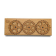 Enigma II Encryption Machine, a working wooden cipher machine by Creative Crafthouse with three rotating laser-engraved alphabet gears for encoding secret messages, shown on a white background.