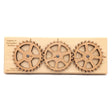 The Creative Crafthouse Enigma II Small cipher machine, three laser engraved alphabet gears on a wood base, on a white background