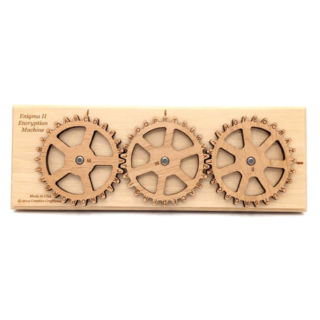 The Creative Crafthouse Enigma II Small cipher machine, three laser engraved alphabet gears on a wood base, on a white background