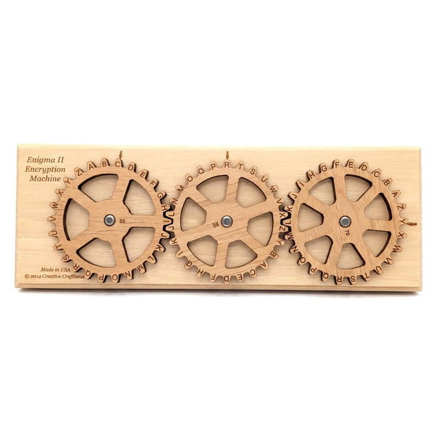 The Creative Crafthouse Enigma II Small cipher machine, three laser engraved alphabet gears on a wood base, on a white background