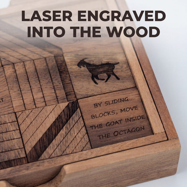 Close detail of the laser engraving on the Get My Goat raintree blocks: the goat silhouette, the instruction By sliding blocks, move the goat inside the octagon, and engraved line patterns, with the tray seated in the notched wood cover. Headline: Laser engraved into the wood.