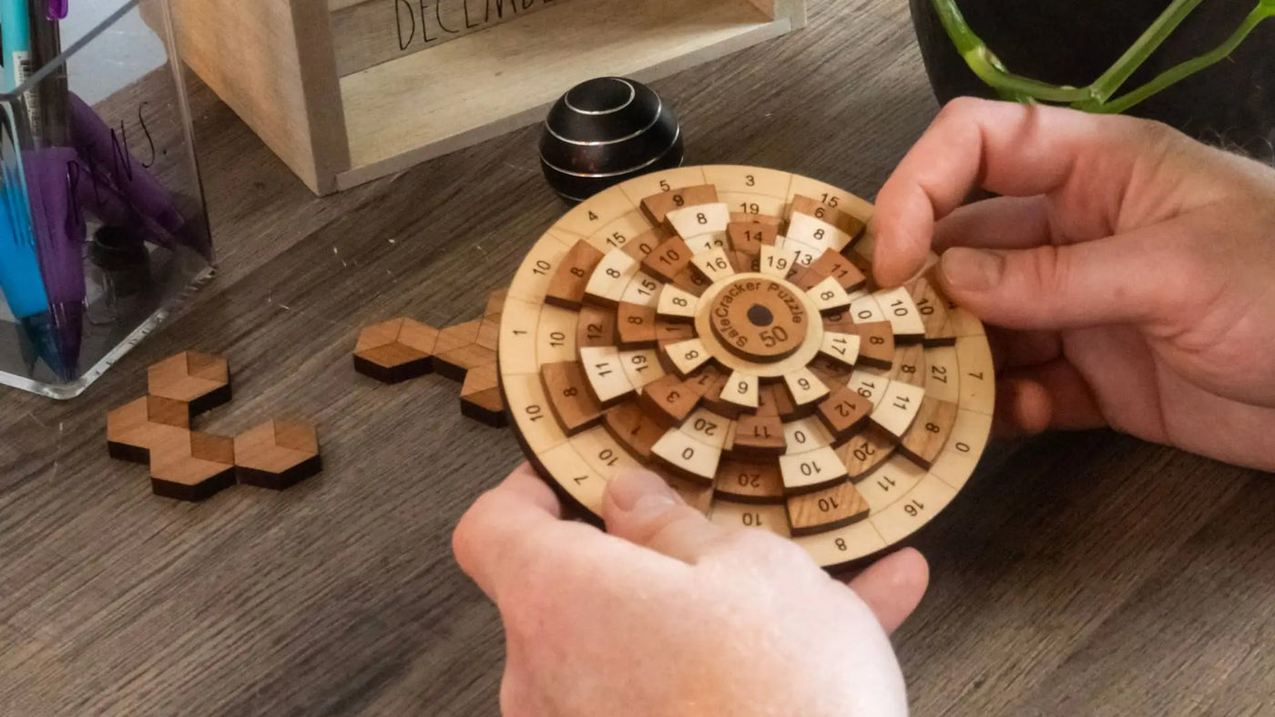 Handmade wooden puzzles brain teasers and games from Creative Crafthouse.
