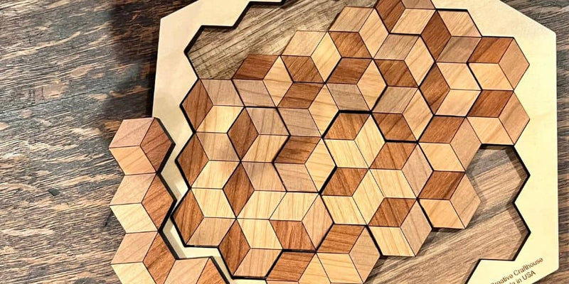 Wooden puzzle with hexagonal pieces on a wooden surface