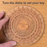 Adult fingertips turning a disk of the Mexican Army Cipher Wheel on an oak desk, seen from above