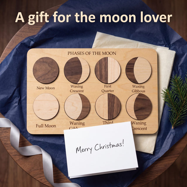 Moon Phases Puzzle as a Christmas gift on navy tissue with a silver ribbon, an evergreen sprig and a Merry Christmas card. Headline: A gift for the moon lover.