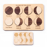 Creative Crafthouse Moon Phases Puzzle on white: engraved board with all 8 phases built from 14 two-tone wood pieces, and the engraved learning key.