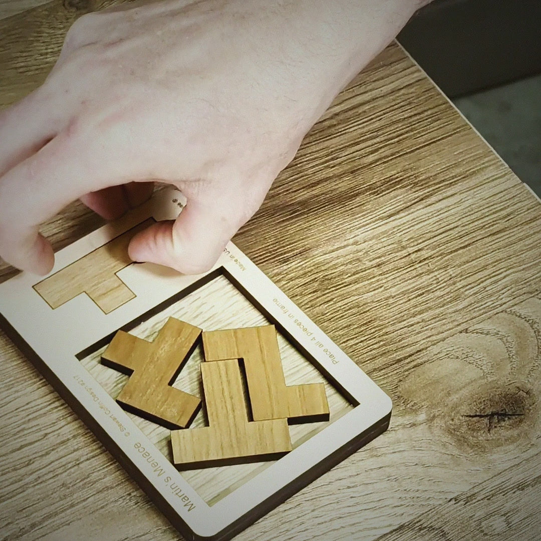 Martin's Menace Small wooden puzzle video by Creative Crafthouse: the four Stewart Coffin Design 217 pieces and the engraved frame, with the Martin Gardner story told in captions