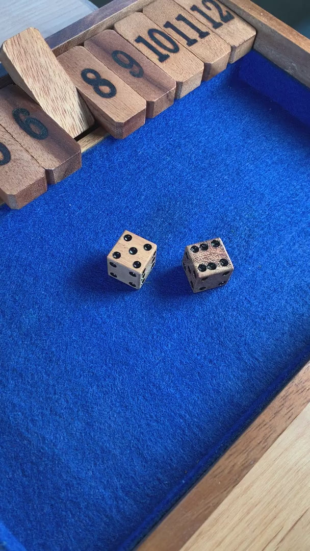 Creative Crafthouse Shut the Box 1-12 boards and dice rolling in the tray; seven-second silent product view.