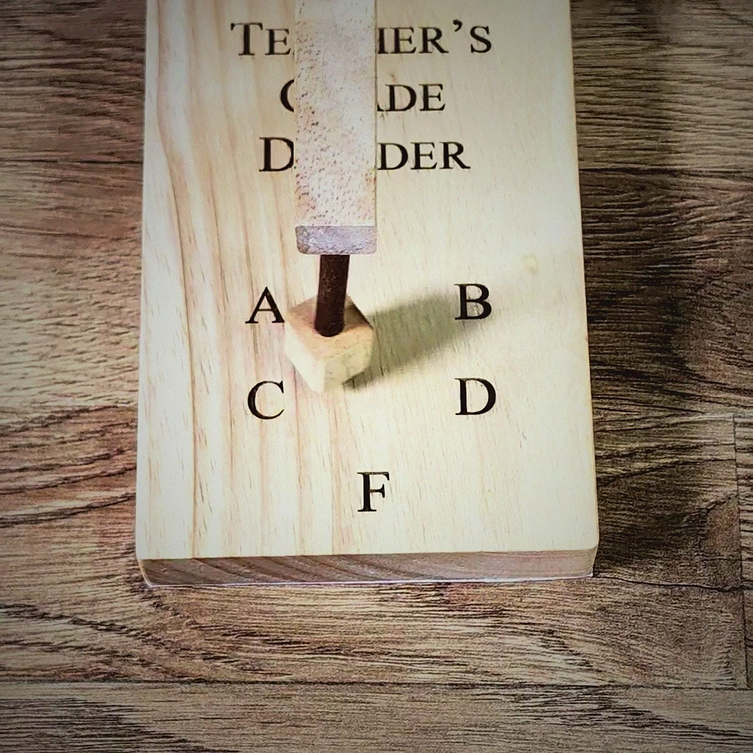 Teacher's Grade Decider demo video: swinging the magnetic pendulum to land on a grade, personalized wooden teacher gift by Creative Crafthouse