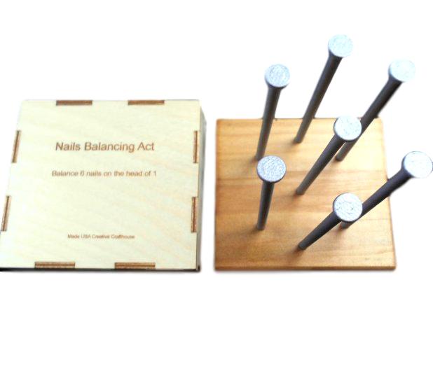Nails Puzzle - Balancing Act - Balance 6 Nails on the Head of 1